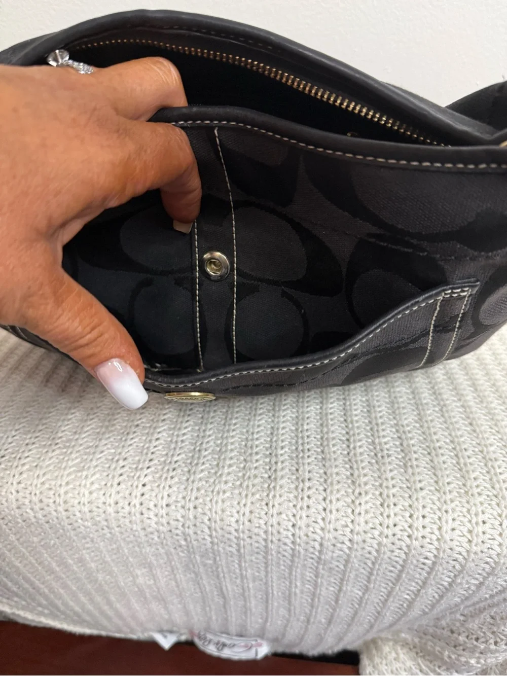 Coach Ergo Signature Jacquard Hobo bag featuring a black-on-black